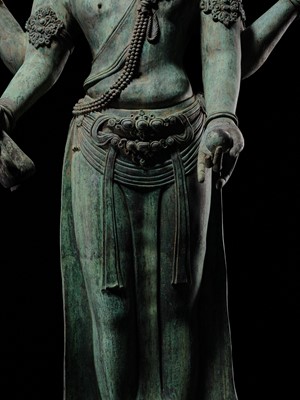 Lot 38 - A COLOSSAL (3.5 METERS HIGH) BRONZE STATUE OF AVALOKITESHVARA, SRIVIJAYA KINGDOM STYLE, CIRCA 18TH-19TH CENTURY OR EARLIER