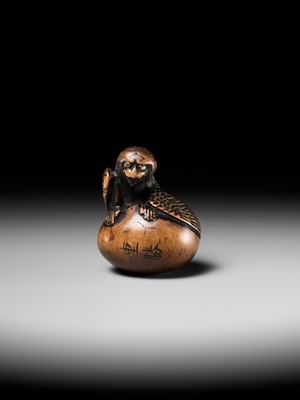 Lot 160 - SHIGEKATSU: A LARGE TANBA SCHOOL WOOD NETSUKE OF A HATCHING TENGU (TENGU NO TAMAGO)