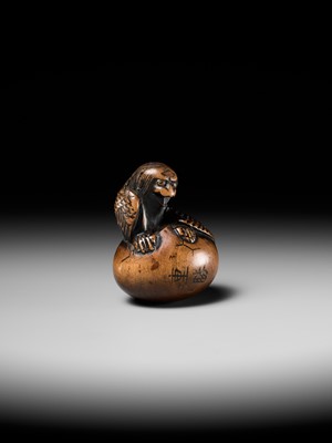 Lot 160 - SHIGEKATSU: A LARGE TANBA SCHOOL WOOD NETSUKE OF A HATCHING TENGU (TENGU NO TAMAGO)