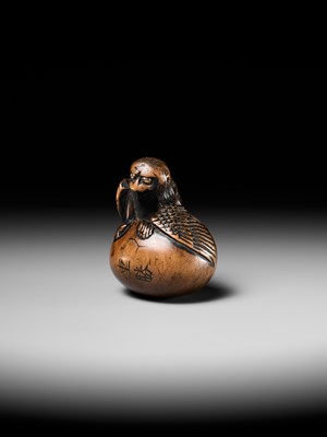 Lot 160 - SHIGEKATSU: A LARGE TANBA SCHOOL WOOD NETSUKE OF A HATCHING TENGU (TENGU NO TAMAGO)