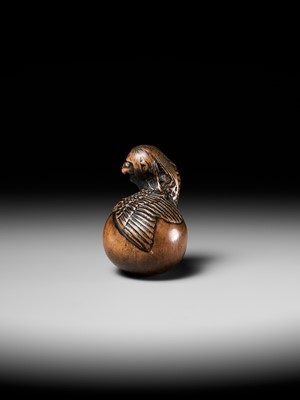 Lot 160 - SHIGEKATSU: A LARGE TANBA SCHOOL WOOD NETSUKE OF A HATCHING TENGU (TENGU NO TAMAGO)