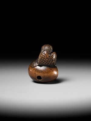 Lot 160 - SHIGEKATSU: A LARGE TANBA SCHOOL WOOD NETSUKE OF A HATCHING TENGU (TENGU NO TAMAGO)