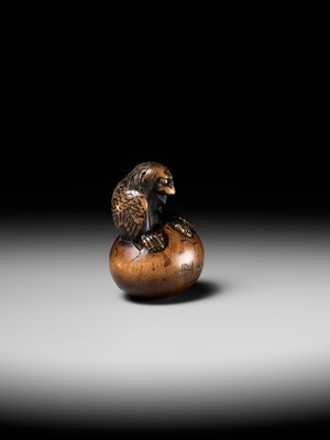 Lot 160 - SHIGEKATSU: A LARGE TANBA SCHOOL WOOD NETSUKE OF A HATCHING TENGU (TENGU NO TAMAGO)