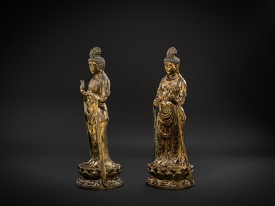 Lot 129 - A PAIR OF LARGE GILT-BRONZE FIGURES OF MAITREYA AND AVALOKITESHVARA