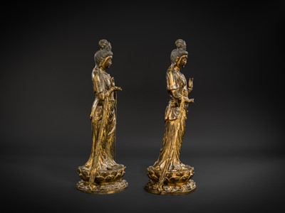 Lot 129 - A PAIR OF LARGE GILT-BRONZE FIGURES OF MAITREYA AND AVALOKITESHVARA