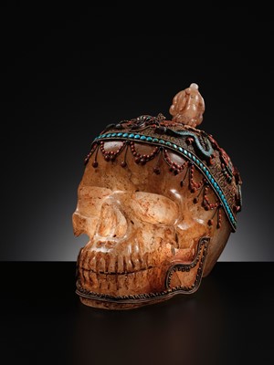 Lot 56 - A MONUMENTAL AND RARE ROCK CRYSTAL SKULL WEARING A GEMSTONE-INLAID GILT-METAL FILIGREE CROWN, 19TH TO FIRST HALF OF 20TH CENTURY