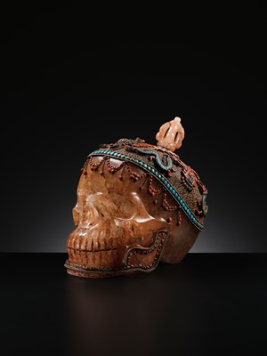 Lot 56 - A MONUMENTAL AND RARE ROCK CRYSTAL SKULL WEARING A GEMSTONE-INLAID GILT-METAL FILIGREE CROWN, 19TH TO FIRST HALF OF 20TH CENTURY