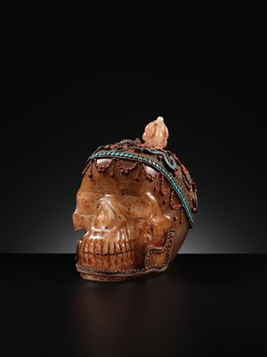 Lot 56 - A MONUMENTAL AND RARE ROCK CRYSTAL SKULL WEARING A GEMSTONE-INLAID GILT-METAL FILIGREE CROWN, 19TH TO FIRST HALF OF 20TH CENTURY