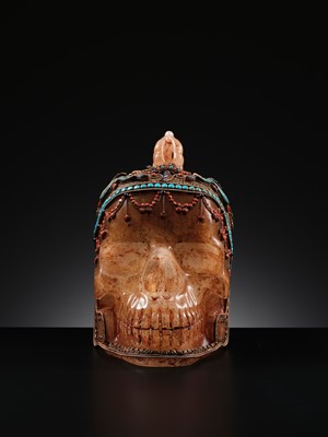 Lot 56 - A MONUMENTAL AND RARE ROCK CRYSTAL SKULL WEARING A GEMSTONE-INLAID GILT-METAL FILIGREE CROWN, 19TH TO FIRST HALF OF 20TH CENTURY