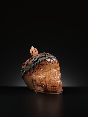 Lot 56 - A MONUMENTAL AND RARE ROCK CRYSTAL SKULL WEARING A GEMSTONE-INLAID GILT-METAL FILIGREE CROWN, 19TH TO FIRST HALF OF 20TH CENTURY