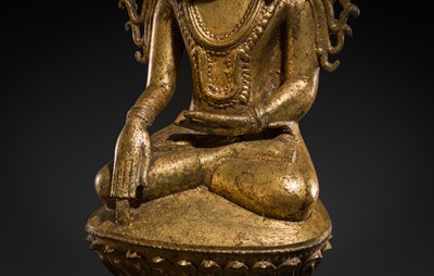 Lot 15 - A GILT-LACQUERED BRONZE FIGURE OF JAMBUPATI BUDDHA, SHAN STATES