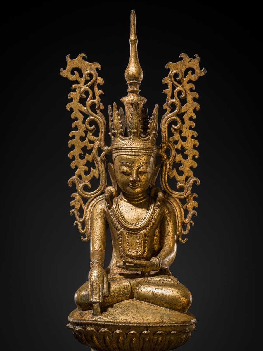 Lot 15 - A GILT-LACQUERED BRONZE FIGURE OF JAMBUPATI BUDDHA, SHAN STATES