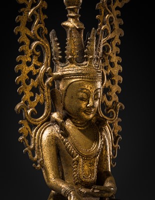 Lot 15 - A GILT-LACQUERED BRONZE FIGURE OF JAMBUPATI BUDDHA, SHAN STATES
