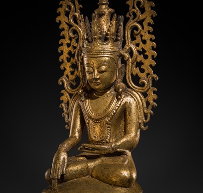 Lot 15 - A GILT-LACQUERED BRONZE FIGURE OF JAMBUPATI BUDDHA, SHAN STATES