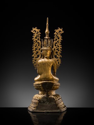 Lot 15 - A GILT-LACQUERED BRONZE FIGURE OF JAMBUPATI BUDDHA, SHAN STATES