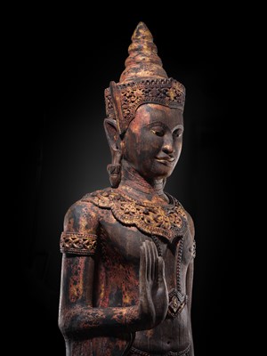 Lot 34 - A RARE AND MONUMENTAL (265 CM HIGH) GILT AND POLYCHROME WOOD FIGURE OF CROWNED BUDDHA, THAILAND, 18TH-19TH CENTURY