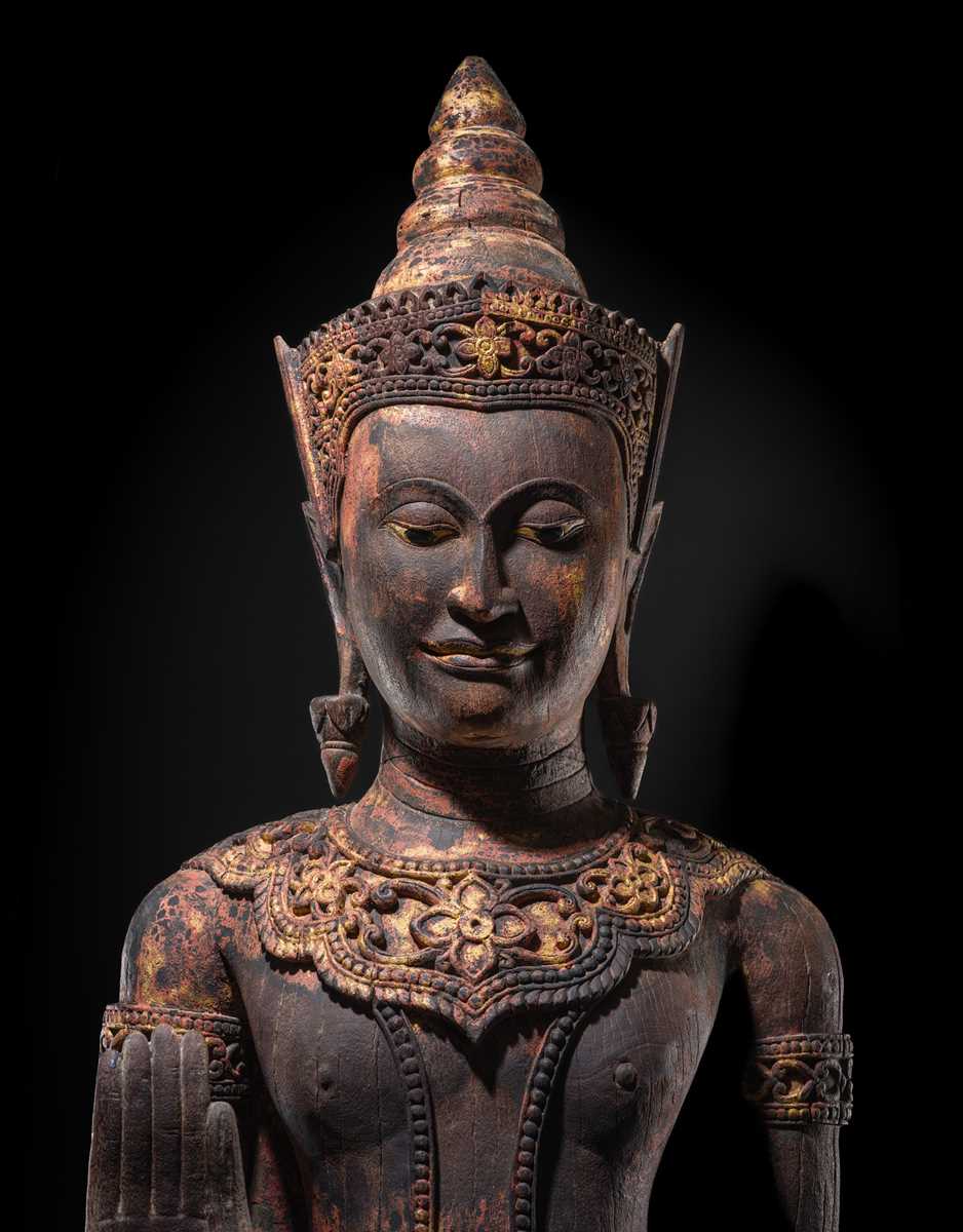 Lot 34 - A RARE AND MONUMENTAL (265 CM HIGH) GILT AND POLYCHROME WOOD FIGURE OF CROWNED BUDDHA, THAILAND, 18TH-19TH CENTURY