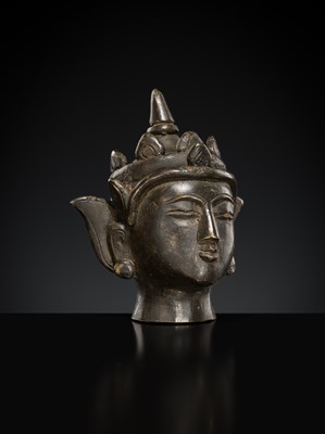 Lot 145 - A SMALL BRONZE HEAD OF CROWNED JAMBHUPATI BUDDHA, ARAKAN STYLE, 18TH-19TH CENTURY OR EARLIER