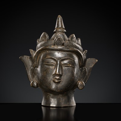 Lot 145 - A SMALL BRONZE HEAD OF CROWNED JAMBHUPATI BUDDHA, ARAKAN STYLE, 18TH-19TH CENTURY OR EARLIER