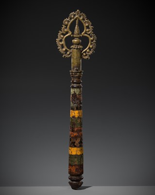 Lot 69 - A RARE BRONZE AND LACQUERED WOOD RITUAL STAFF, 17TH-18TH CENTURY