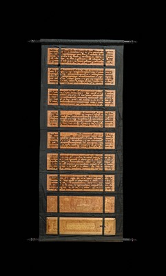 Lot 18 - TWO LARGE GILT AND RED-LACQUERED PALM LEAF AND WOOD KAMMAVACA BOOKS, KONBAUNG DYNASTY