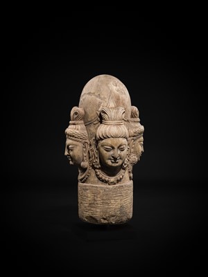 Lot 65 - A WHITE MARBLE CHATURMUKHA LINGAM, 8TH-10TH CENTURY