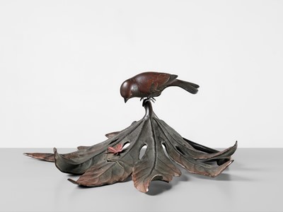Lot 68 - A FINE BRONZE OKIMONO OF A SPARROW ON AN ARALIA LEAF