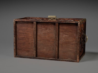 Lot 117 - A LARGE HUANGHUALI WOOD CHEST AND STAND, 1900s