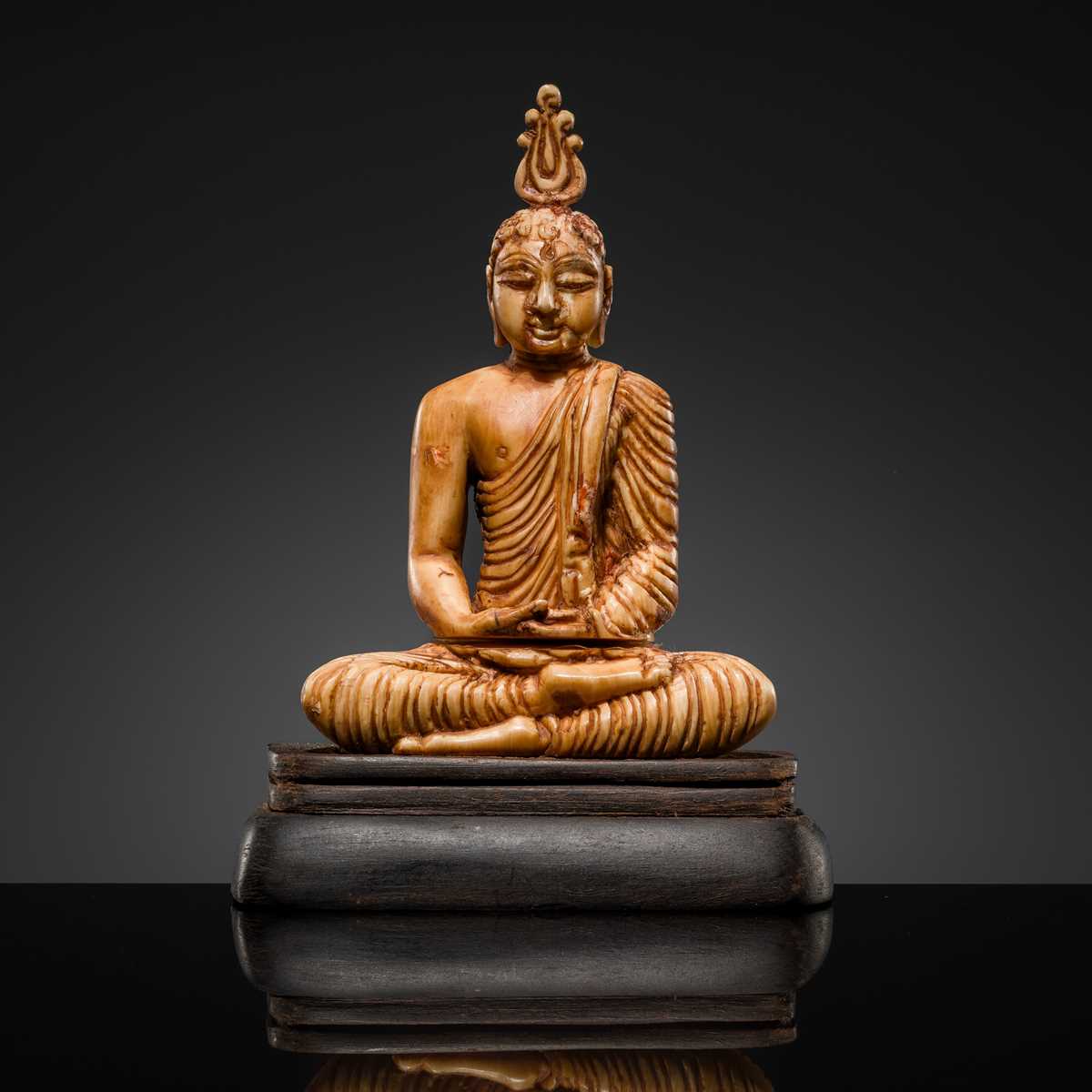 Lot 49 - AN IVORY FIGURE OF BUDDHA SHAKYAMUNI, 18TH-19TH CENTURY