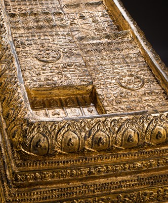 Lot 62 - A GILT-LACQUER BRONZE SCULPTURE OF THE WALKING BUDDHA’S FOOTPRINTS, BUDDHAPADA, RATTANAKOSIN PERIOD