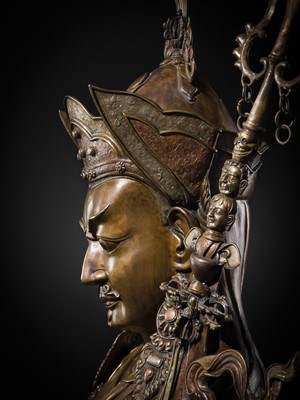 Lot 96 - A HIGHLY IMPORTANT AND MONUMENTAL (167 CM) INLAID BRONZE FIGURE OF GURU RINPOCHE, PADMASAMBHAVA, BHUTAN, 19TH OR VERY EARLY 20TH CENTURY