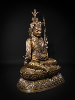 Lot 96 - A HIGHLY IMPORTANT AND MONUMENTAL (167 CM) INLAID BRONZE FIGURE OF GURU RINPOCHE, PADMASAMBHAVA, BHUTAN, 19TH OR VERY EARLY 20TH CENTURY