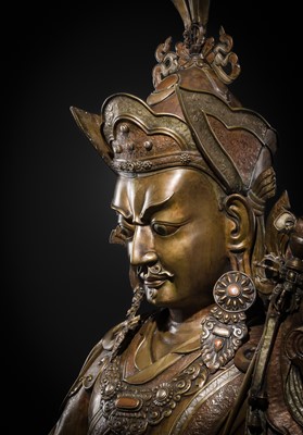 Lot 96 - A HIGHLY IMPORTANT AND MONUMENTAL (167 CM) INLAID BRONZE FIGURE OF GURU RINPOCHE, PADMASAMBHAVA, BHUTAN, 19TH OR VERY EARLY 20TH CENTURY