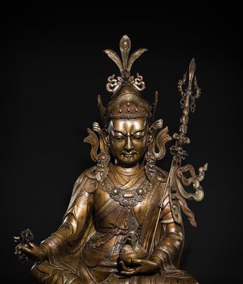 Lot 96 - A HIGHLY IMPORTANT AND MONUMENTAL (167 CM) INLAID BRONZE FIGURE OF GURU RINPOCHE, PADMASAMBHAVA, BHUTAN, 19TH OR VERY EARLY 20TH CENTURY