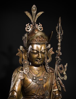 Lot 96 - A HIGHLY IMPORTANT AND MONUMENTAL (167 CM) INLAID BRONZE FIGURE OF GURU RINPOCHE, PADMASAMBHAVA, BHUTAN, 19TH OR VERY EARLY 20TH CENTURY