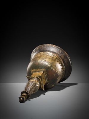 Lot 117 - A GILT COPPER ALLOY RELIQUARY SVAYAMBHU STUPA, NEPAL, 17TH-18TH CENTURY