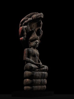 Lot 40 - A MONUMENTAL (215 CM HIGH) AND IMPORTANT WOOD SCULPTURE OF BUDDHA MUCHALINDA, POST-ANGKORIAN PERIOD
