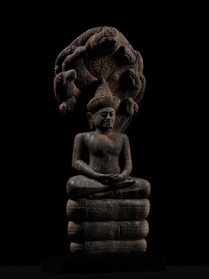 Lot 40 - A MONUMENTAL (215 CM HIGH) AND IMPORTANT WOOD SCULPTURE OF BUDDHA MUCHALINDA, POST-ANGKORIAN PERIOD