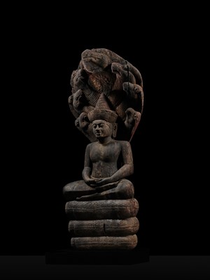 Lot 40 - A MONUMENTAL (215 CM HIGH) AND IMPORTANT WOOD SCULPTURE OF BUDDHA MUCHALINDA, POST-ANGKORIAN PERIOD