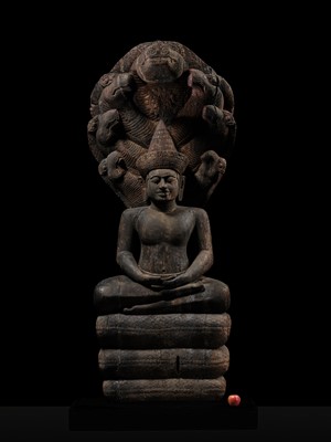 Lot 40 - A MONUMENTAL (215 CM HIGH) AND IMPORTANT WOOD SCULPTURE OF BUDDHA MUCHALINDA, POST-ANGKORIAN PERIOD