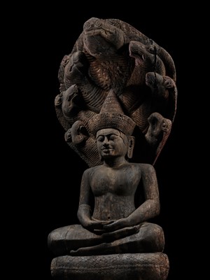Lot 40 - A MONUMENTAL (215 CM HIGH) AND IMPORTANT WOOD SCULPTURE OF BUDDHA MUCHALINDA, POST-ANGKORIAN PERIOD