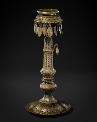 Lot 229 - A LARGE BRONZE RETICULATED TEMPLE LAMP, NEPAL, 18TH-19TH CENTURY