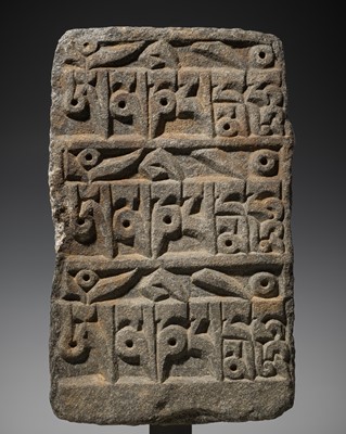 Lot 135 - A MANI STONE, TIBET, 19TH CENTURY OR EARLIER