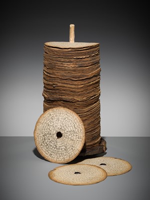 Lot 185 - THE SCRIPTURE CONTENTS OF A LARGE PRAYER WHEEL, TIBET, 19 CENTURY