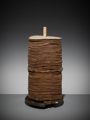 Lot 185 - THE SCRIPTURE CONTENTS OF A LARGE PRAYER WHEEL, TIBET, 19 CENTURY