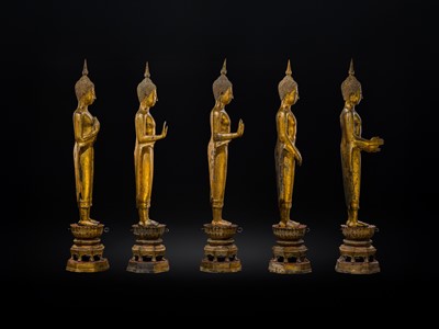 Lot 28 - A RARE GROUP OF FIVE LARGE (156 CM HIGH) GILT-LACQUERED FIGURES OF BUDDHAS, LATE AYUTTHAYA TO EARLY RATTANAKOSIN PERIOD