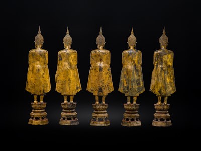 Lot 28 - A RARE GROUP OF FIVE LARGE (156 CM HIGH) GILT-LACQUERED FIGURES OF BUDDHAS, LATE AYUTTHAYA TO EARLY RATTANAKOSIN PERIOD