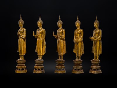 Lot 28 - A RARE GROUP OF FIVE LARGE (156 CM HIGH) GILT-LACQUERED FIGURES OF BUDDHAS, LATE AYUTTHAYA TO EARLY RATTANAKOSIN PERIOD