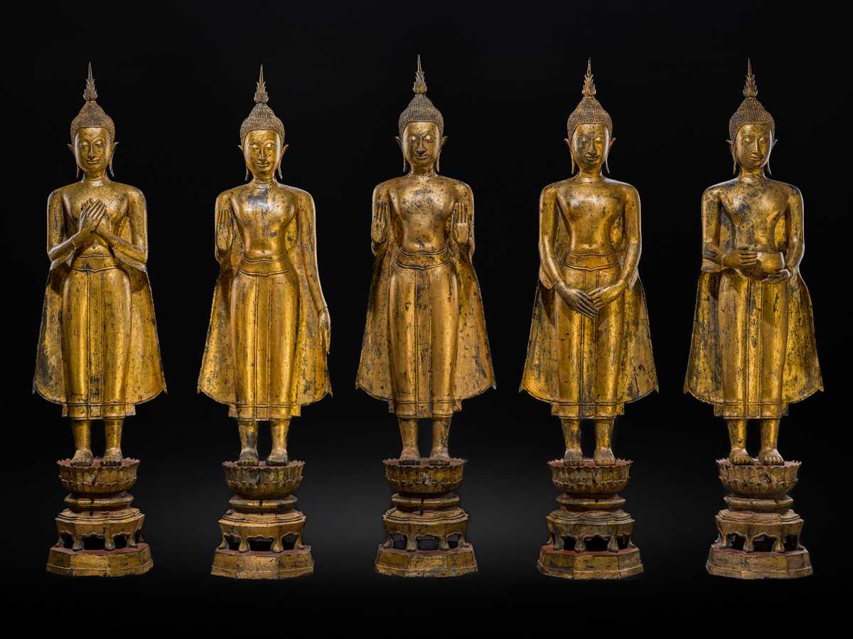 Lot 28 - A RARE GROUP OF FIVE LARGE (156 CM HIGH) GILT-LACQUERED FIGURES OF BUDDHAS, LATE AYUTTHAYA TO EARLY RATTANAKOSIN PERIOD