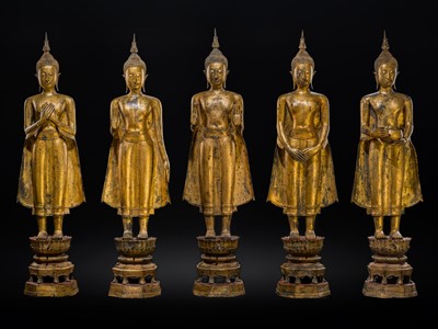 Lot 28 - A RARE GROUP OF FIVE LARGE (156 CM HIGH) GILT-LACQUERED FIGURES OF BUDDHAS, LATE AYUTTHAYA TO EARLY RATTANAKOSIN PERIOD